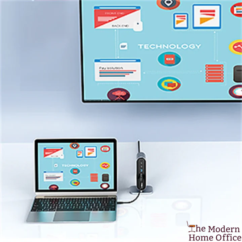 Hub 3.0 Docking Station Multiport Adapter. Versatile & compact docking station designed to provide a multitude of ports & enhance productivity by connecting all essential devices. Ideal for both professional & personal use, it simplifies setup by combining multiple functionalities into a single, sleek unit.-The Modern Home Office