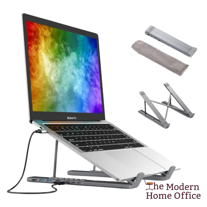 Elevate your laptop experience with our Aluminum Laptop Stand featuring an integrated USB hub. Engineered for ergonomic comfort and convenience, this stand raises your laptop to eye level, reducing strain on your neck and shoulders during extended use. With built-in USB ports, it provides easy access to additional connectivity options, allowing you to connect peripherals and accessories with ease. -The Modern Home Office