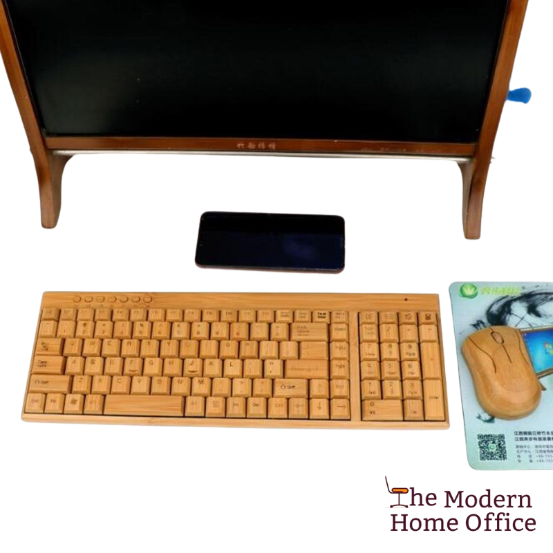 The Bamboo Keyboard and Wireless Mouse Combo Set is a unique and environmentally-friendly computer accessory bundle that combines a keyboard and a mouse, both featuring bamboo elements. -The Modern Home Office