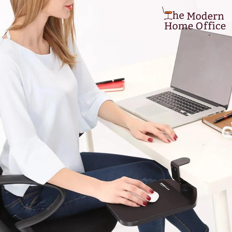 Introducing our Adjustable Desk Mouse Tray, designed to enhance your comfort and productivity while working or gaming. This innovative accessory attaches seamlessly to the edge of your desk, providing a convenient platform for your mouse that can be easily adjusted to your preferred height and angle. -The Modern Home Office